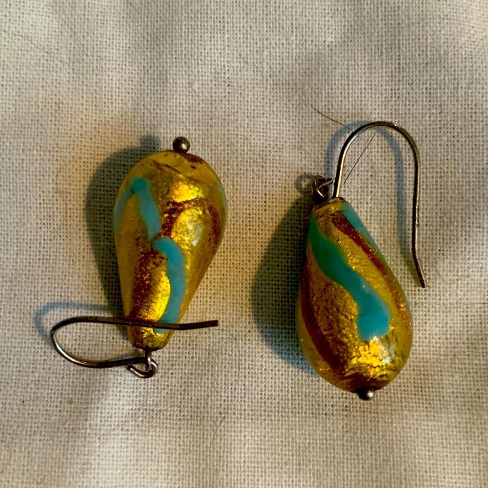 Beautiful glass teardrop earrings in gold and teal color.